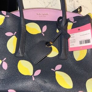 kate spade navy leather tote with yellow lemon print and pink accents